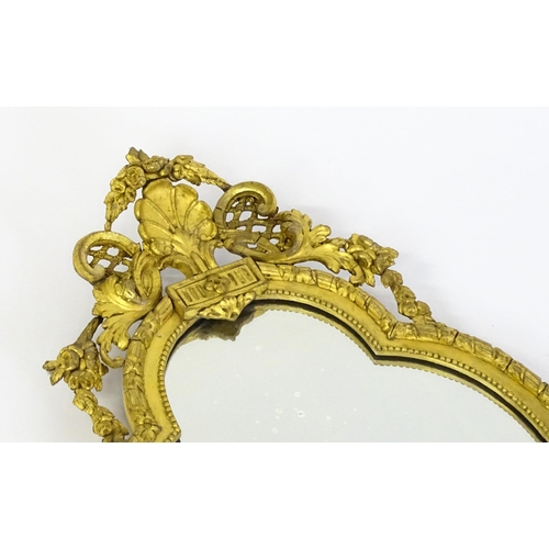 1501 - A pair of 19thC giltwood and gesso girandoles with shell motifs, lattice pattern mouldings, fluted d... 