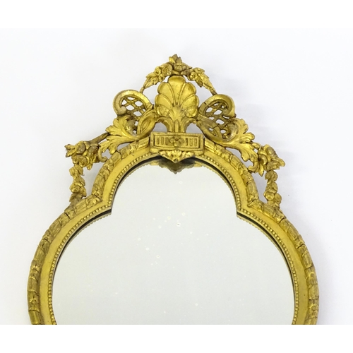 1501 - A pair of 19thC giltwood and gesso girandoles with shell motifs, lattice pattern mouldings, fluted d... 