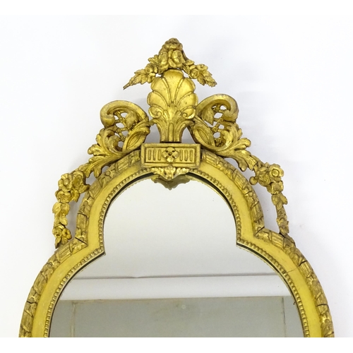 1501 - A pair of 19thC giltwood and gesso girandoles with shell motifs, lattice pattern mouldings, fluted d... 