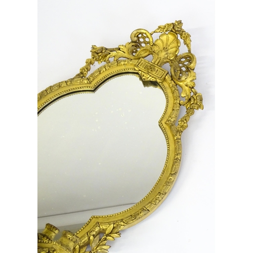 1501 - A pair of 19thC giltwood and gesso girandoles with shell motifs, lattice pattern mouldings, fluted d... 