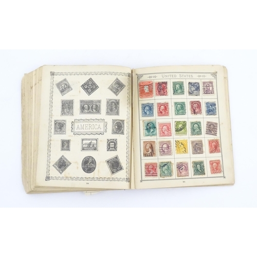 2147 - Stamps / Postal History: An early 20thC postage stamp album, containing numerous affixed worldwide s... 