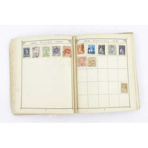 2147 - Stamps / Postal History: An early 20thC postage stamp album, containing numerous affixed worldwide s... 