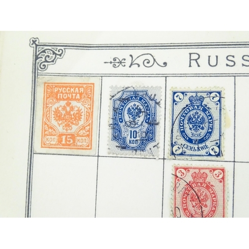 2147 - Stamps / Postal History: An early 20thC postage stamp album, containing numerous affixed worldwide s... 