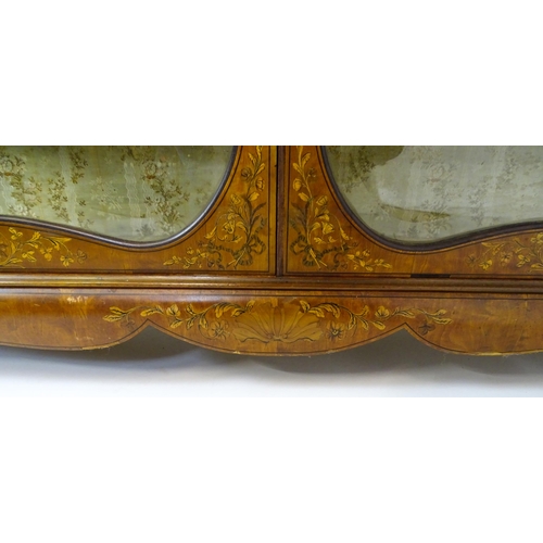 1475 - A late 19thC satinwood bookcase with a profusely inlaid frame with satinwood, box wood and fruit woo... 