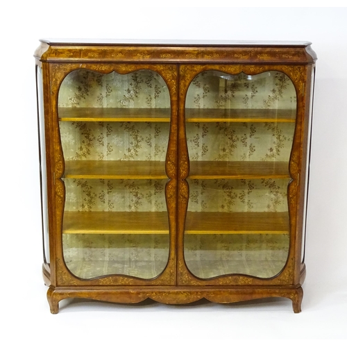 1475 - A late 19thC satinwood bookcase with a profusely inlaid frame with satinwood, box wood and fruit woo... 