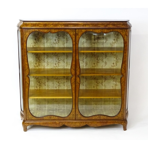 1475 - A late 19thC satinwood bookcase with a profusely inlaid frame with satinwood, box wood and fruit woo... 