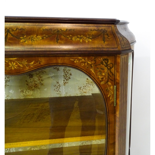 1475 - A late 19thC satinwood bookcase with a profusely inlaid frame with satinwood, box wood and fruit woo... 