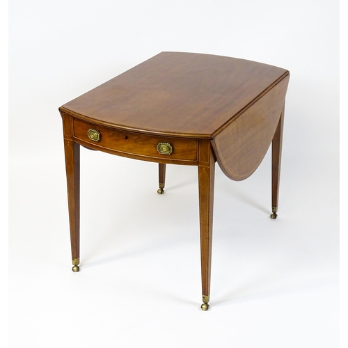 1478 - An early 19thC mahogany Pembroke table with a satinwood strung top above a single frieze drawer rais... 