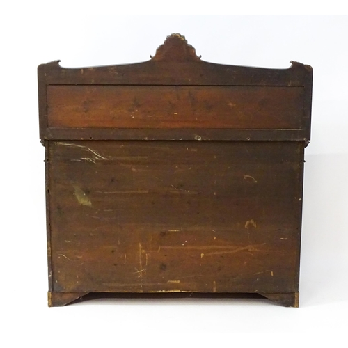 1489 - A 19thC rosewood chiffonier with a shaped upstand surmounted by a carved crest and a long shelf supp... 