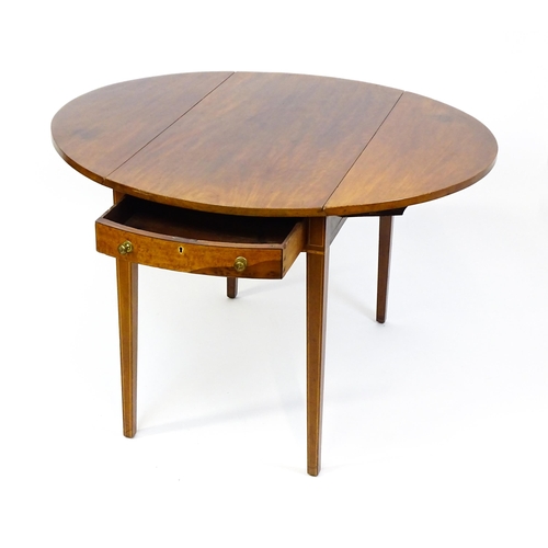 1494 - A late Georgian mahogany and satinwood Pembroke table with two demi lune drop leaves flanking a sing... 