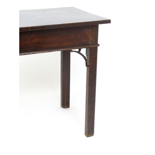 1495 - A late 18thC / early 19thC mahogany Chippendale style side table with brackets to the apron and rais... 