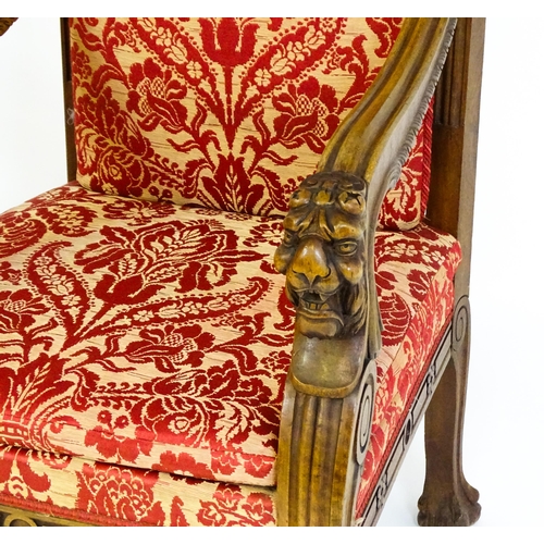 1497 - A pair of 19thC continental mahogany armchairs surmounted by corbel style reeded mounts and lions ma... 