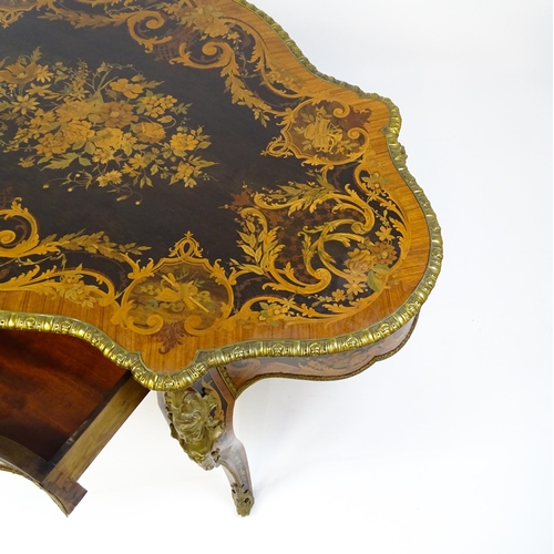 1498 - A 19thC kingwood centre table with a marquetry inlaid top having satinwood, mahogany, walnut and oth... 