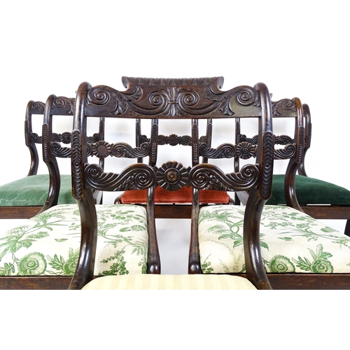 1502 - A set of six early / mid 19thC Irish dining chairs with floral and scroll carved mid and top rails a... 