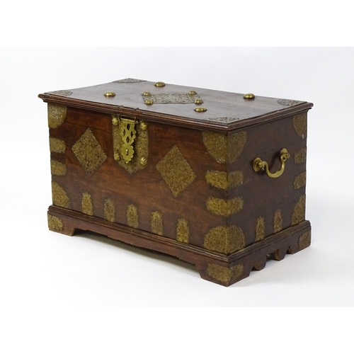 1503 - A 19thC marriage chest / dowry chest with brass mounts and brackets decorating the exterior alongsid... 