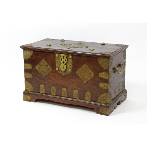 1503 - A 19thC marriage chest / dowry chest with brass mounts and brackets decorating the exterior alongsid... 