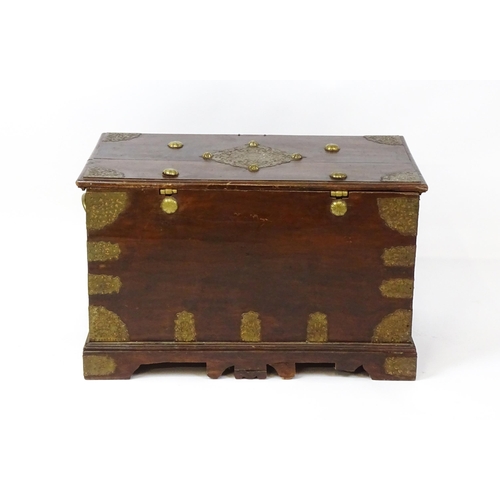 1503 - A 19thC marriage chest / dowry chest with brass mounts and brackets decorating the exterior alongsid... 