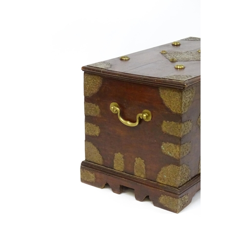 1503 - A 19thC marriage chest / dowry chest with brass mounts and brackets decorating the exterior alongsid... 