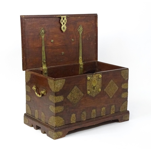 1503 - A 19thC marriage chest / dowry chest with brass mounts and brackets decorating the exterior alongsid... 