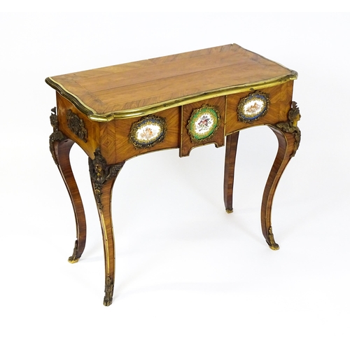 1505 - A mid 19thC kingwood side table with a brass moulding to the top edge and three Sevres style plaques... 