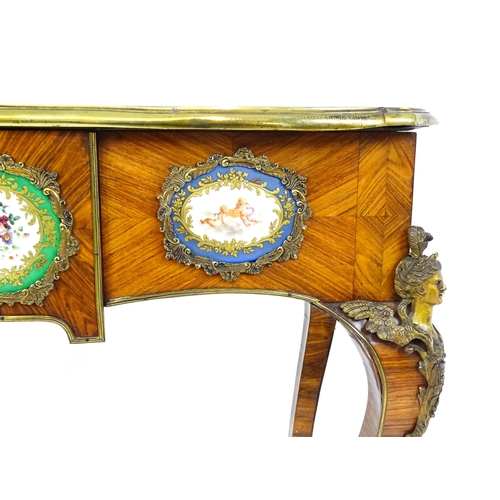 1505 - A mid 19thC kingwood side table with a brass moulding to the top edge and three Sevres style plaques... 