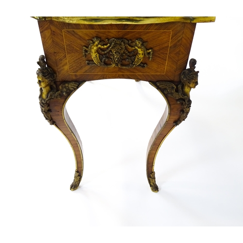 1505 - A mid 19thC kingwood side table with a brass moulding to the top edge and three Sevres style plaques... 