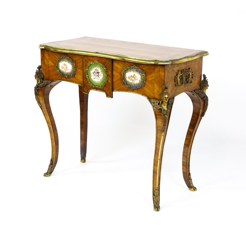 1505 - A mid 19thC kingwood side table with a brass moulding to the top edge and three Sevres style plaques... 