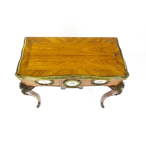 1505 - A mid 19thC kingwood side table with a brass moulding to the top edge and three Sevres style plaques... 