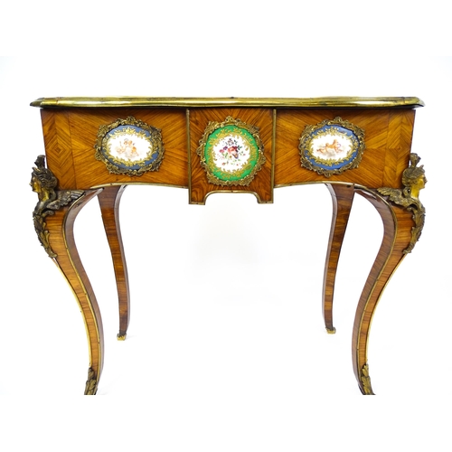 1505 - A mid 19thC kingwood side table with a brass moulding to the top edge and three Sevres style plaques... 