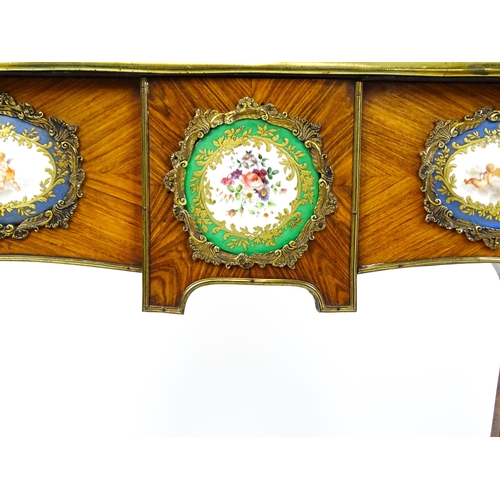 1505 - A mid 19thC kingwood side table with a brass moulding to the top edge and three Sevres style plaques... 