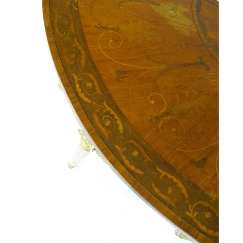 1507 - A demi lune console table with a marquetry inlaid top above a fluted frieze and moulded floral decor... 