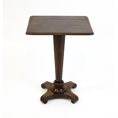 1508 - A 19thC rosewood occasional table with a canted pedestal above a carved plinth and quatre form base ... 