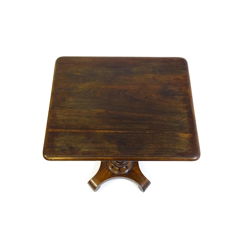 1508 - A 19thC rosewood occasional table with a canted pedestal above a carved plinth and quatre form base ... 