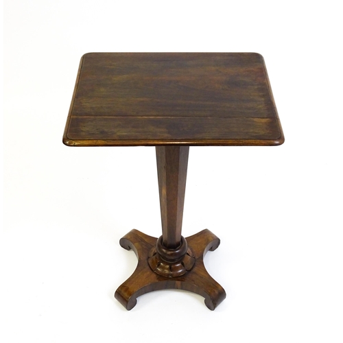 1508 - A 19thC rosewood occasional table with a canted pedestal above a carved plinth and quatre form base ... 