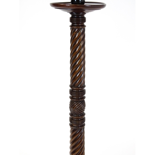 1509 - A Victorian mahogany torchiere / jardinière stand with a twist turned pedestal with carved decoratio... 