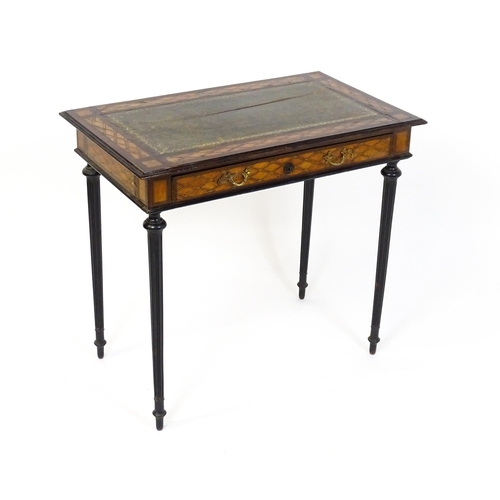 1513 - A 19thC side table with a satinwood inlaid top enclosing a gold tooled green leather top above a sin... 