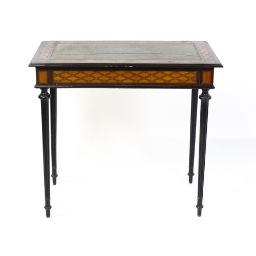 1513 - A 19thC side table with a satinwood inlaid top enclosing a gold tooled green leather top above a sin... 