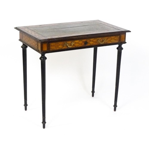 1513 - A 19thC side table with a satinwood inlaid top enclosing a gold tooled green leather top above a sin... 