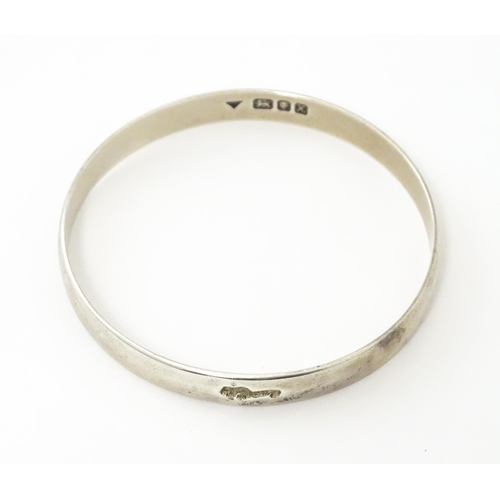 728 - A silver bracelet hallmarked London 1997 maker Brian Leslie Fuller.