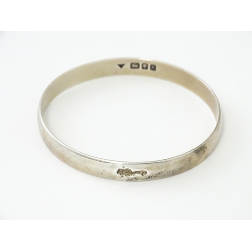 728 - A silver bracelet hallmarked London 1997 maker Brian Leslie Fuller.