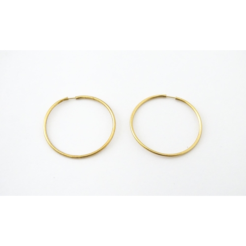 745 - A quantity of assorted 9ct, yellow metal and gilt metal jewellery to include rings and earrings.