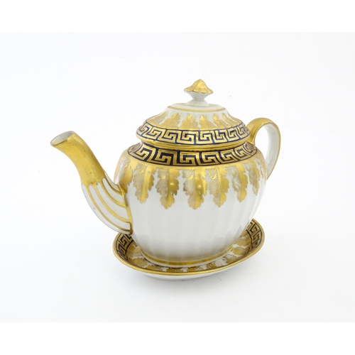 110 - A Coalport John Rose teapot and stand with Greek Key detail. Teapot approx. 9 1/2