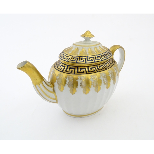 110 - A Coalport John Rose teapot and stand with Greek Key detail. Teapot approx. 9 1/2