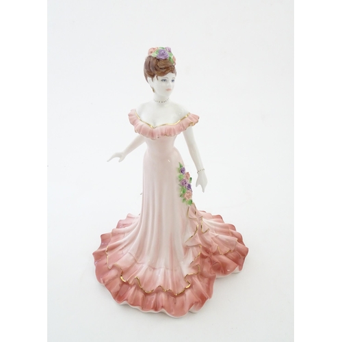 111 - A Coalport limited edition lady Celebration no. 1406 / 1750. Marked under. Approx. 8 3/4