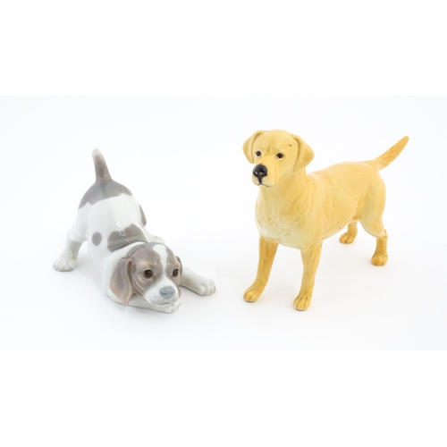 125 - A Beswick model of a Golden Labrador. Together with a Lladro playful puppy. Beswick dog approx. 5 1/... 