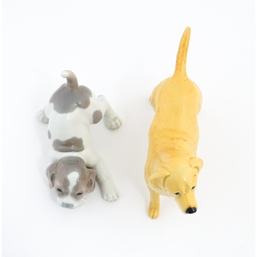 125 - A Beswick model of a Golden Labrador. Together with a Lladro playful puppy. Beswick dog approx. 5 1/... 