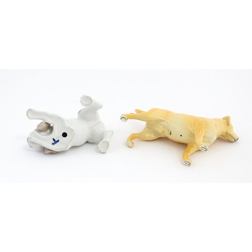 125 - A Beswick model of a Golden Labrador. Together with a Lladro playful puppy. Beswick dog approx. 5 1/... 