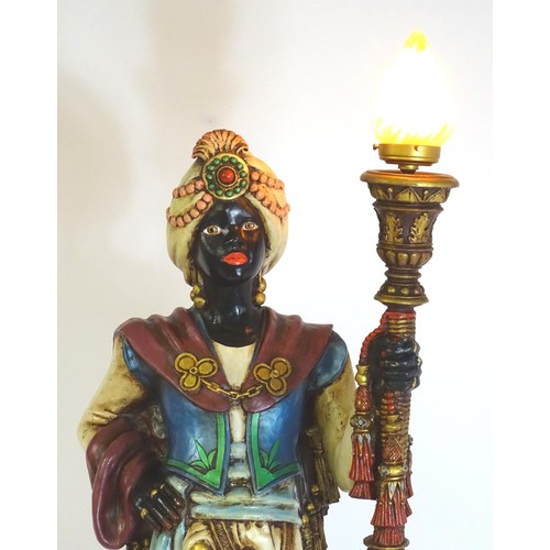 1419 - A mid 20thC blackamoor lamp, the lamp having a polychrome figural top grasping a torchiere, the figu... 