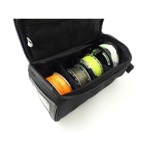 1122 - Fishing : a cased Greys GRX i+ centrepin fly reel and three spools (with line), the reel approx 3 3/... 