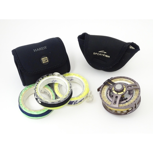 1124 - Fishing : a Hardy Ultralite 5000 CLS centrepin fly reel, together with a Hardy's neoprene case conta... 